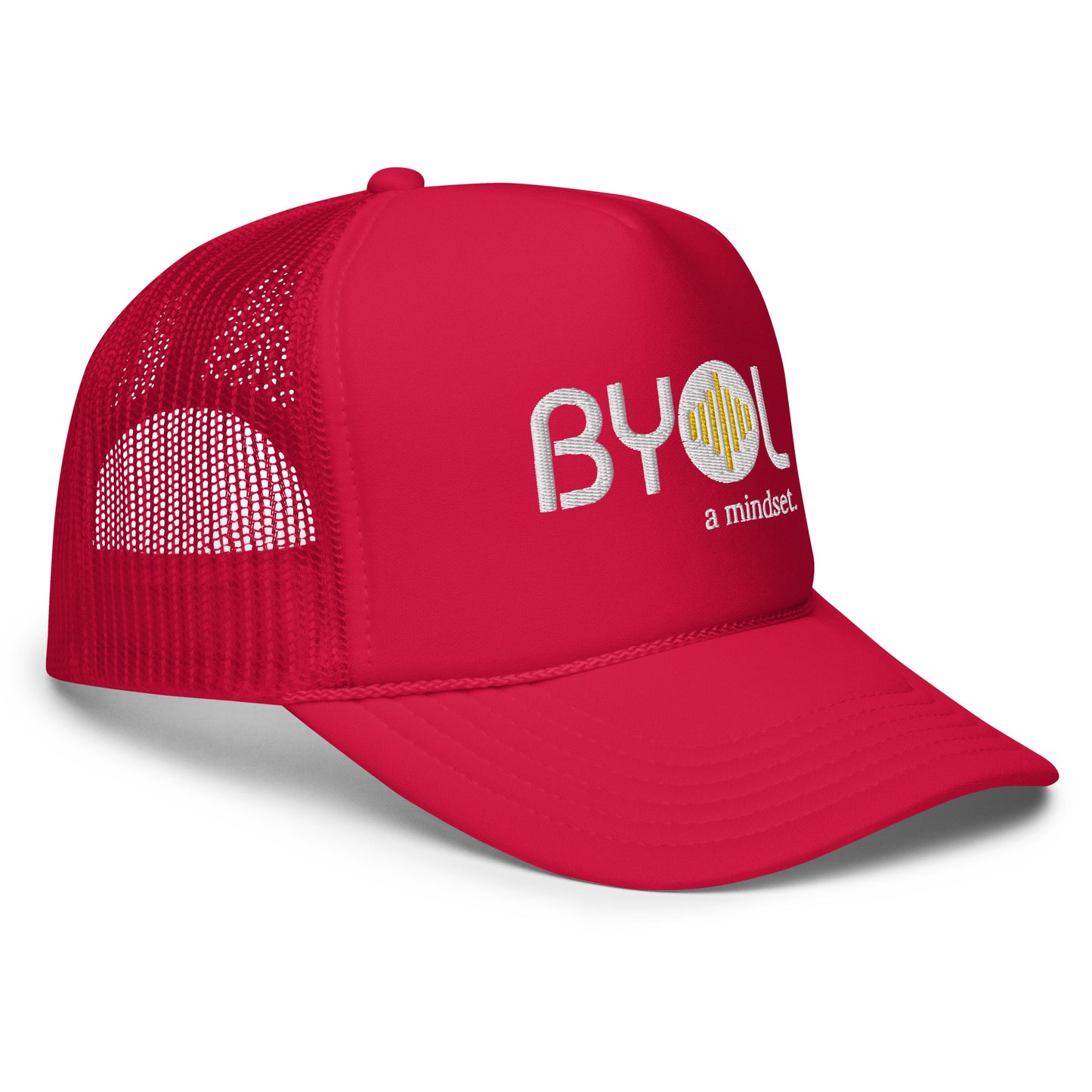 Side of red foam trucker hat with "BYOL a mindset" embroidered on the front in white and yellow, featuring a black mesh back, displayed against a clean background. Available in various colors: black, white and blue, blue, pink, and white.