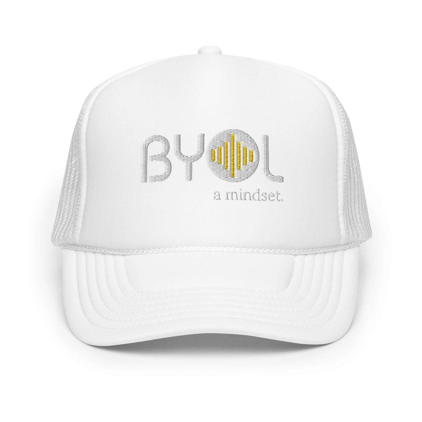 White on white foam trucker hat with "BYOL a mindset" embroidered on the front in gray and yellow, displayed against a clean background. Available in various colors: black, white and blue, blue, pink, and white.