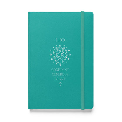 Turquois hardcover notebook with the word "low" on top, then an image of a lion followed by three different leo traits and the leo zodiac sign. 