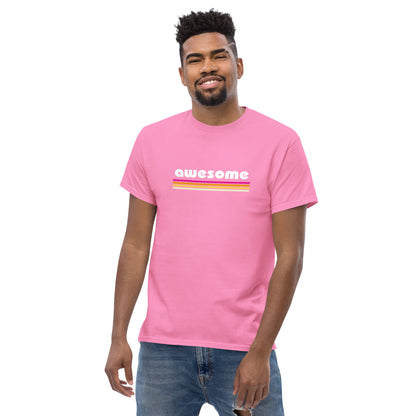 Confident man sporting an pink classic tee with a retro 'awesome' design, embodying a cool, empowering vibe.