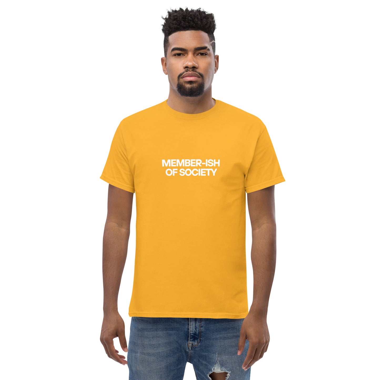 Man in a yellow classic tee featuring a white 'MEMBER-ISH OF SOCIETY' text, a playful nod to sarcastic self-expression.