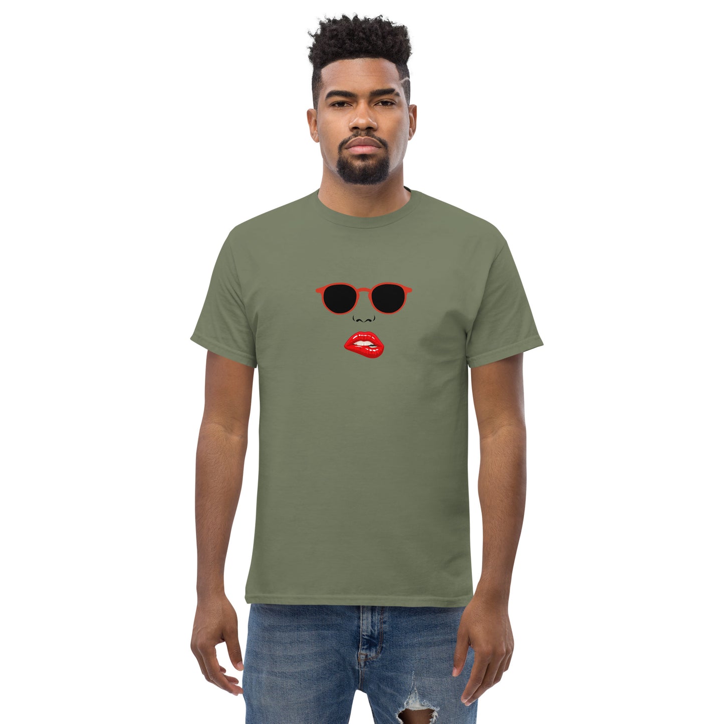 Man wearing a military green classic tee with a quirky red lips and sunglasses graphic, channeling a fun and bold personal style statement.