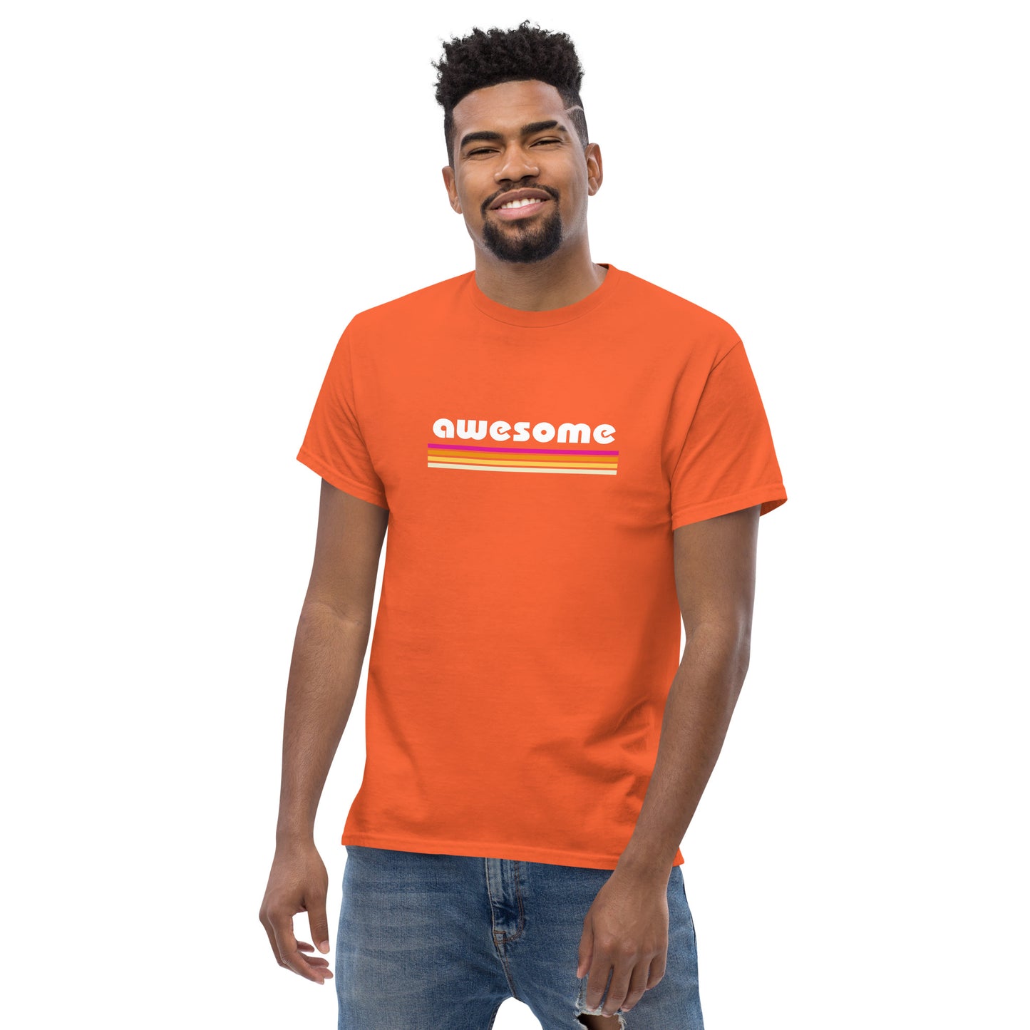 Confident man sporting an orange classic tee with a retro 'awesome' design, embodying a cool, empowering vibe.