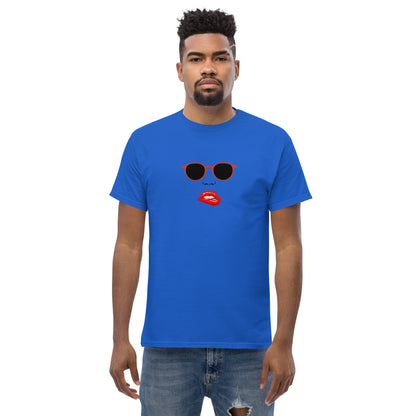 Man wearing a royal blue classic tee with a quirky red lips and sunglasses graphic, channeling a fun and bold personal style statement.