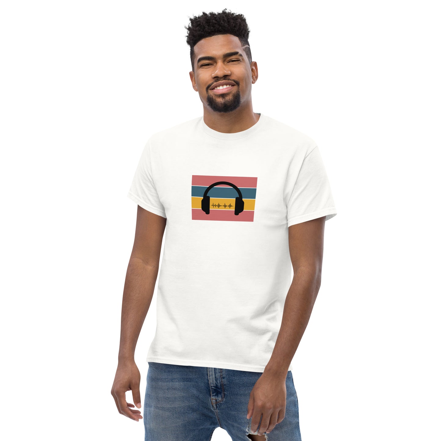 Man smiling in a white classic tee featuring a sunset and skyline design with 'Life Is Good' text, symbolizing optimism and bold living.