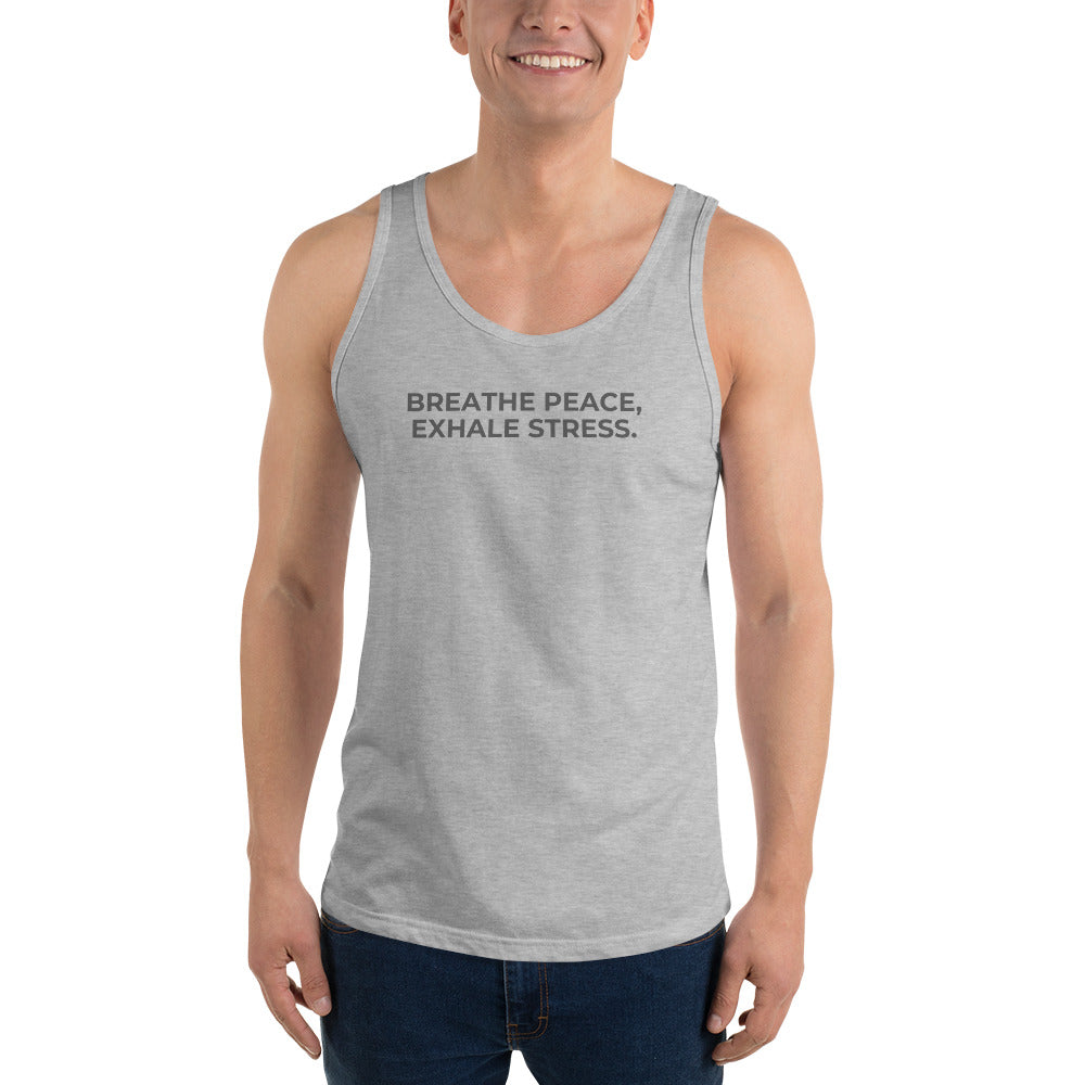 Man wearing a athletic grey sleeveless tank with "Breathe Peace, Exhale Stress" text.