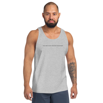 Man wearing a athletic grey sleeveless tank with "You Are Your Greatest Investment" text. 