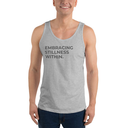 Man wearing a athletic grey sleeveless tank with "Embracing Stillness Within" text. 