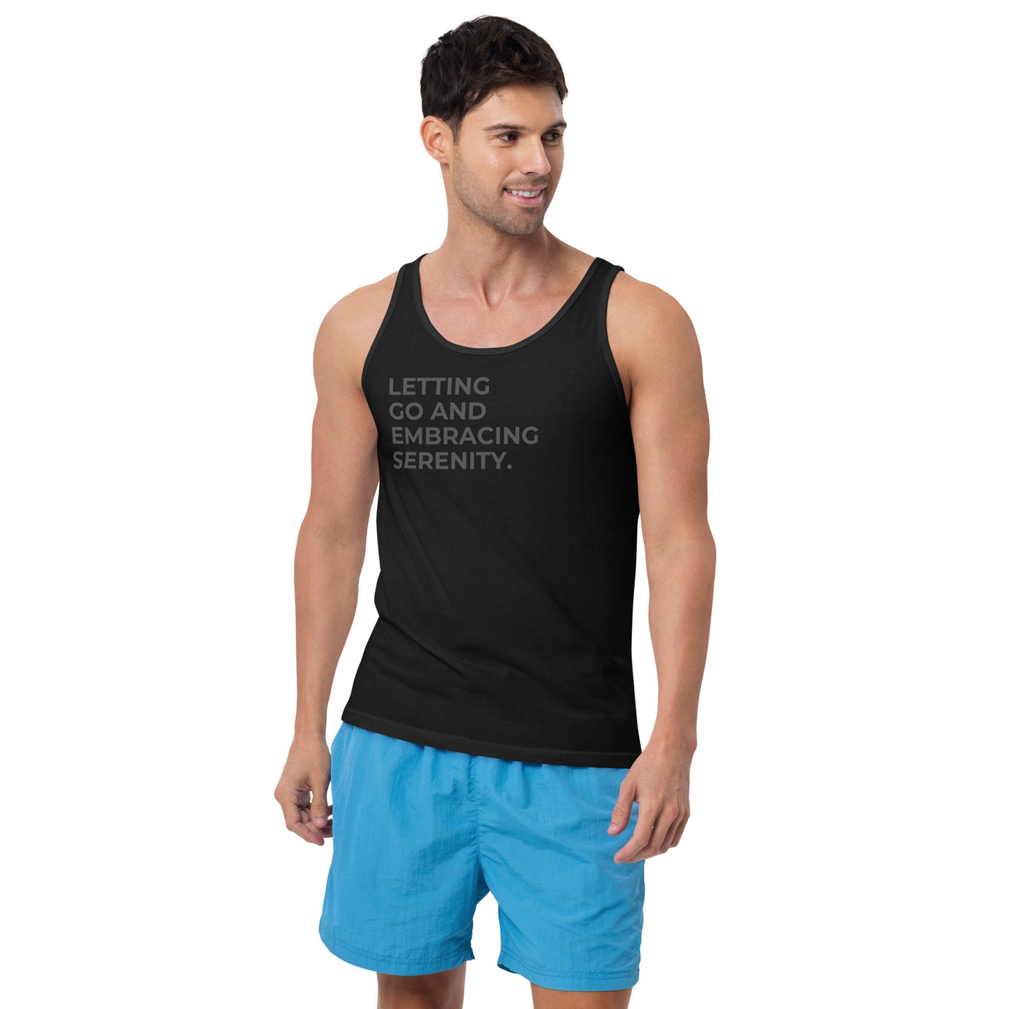 Man wearing a black sleeveless tank with "Letting Go and Embracing Serenity" text.