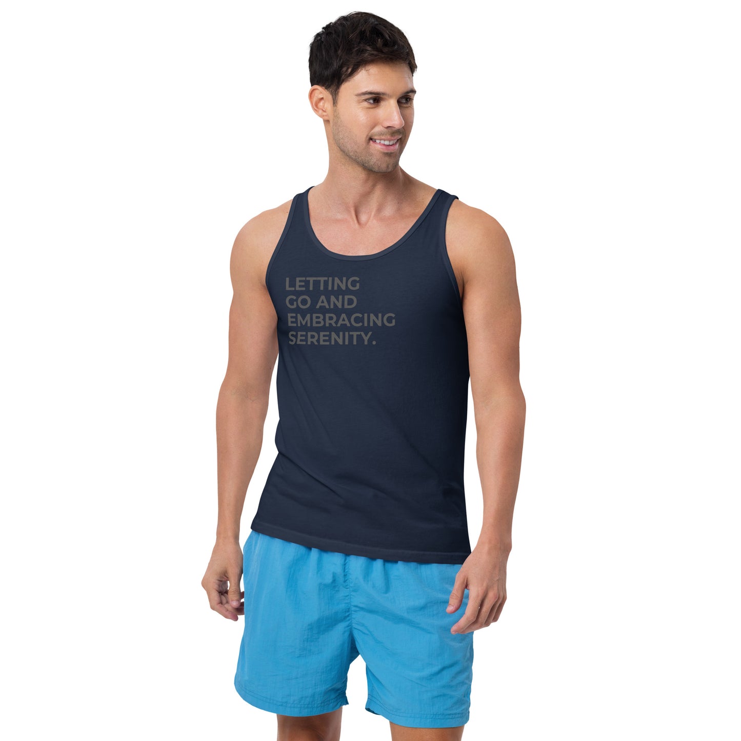 Man wearing a navy sleeveless tank with "Letting Go and Embracing Serenity" text.