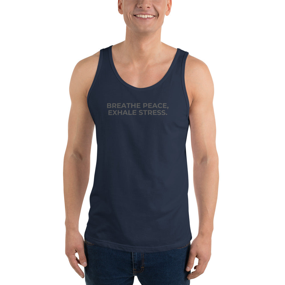 Man wearing a navy sleeveless tank with "Breathe Peace, Exhale Stress" text.