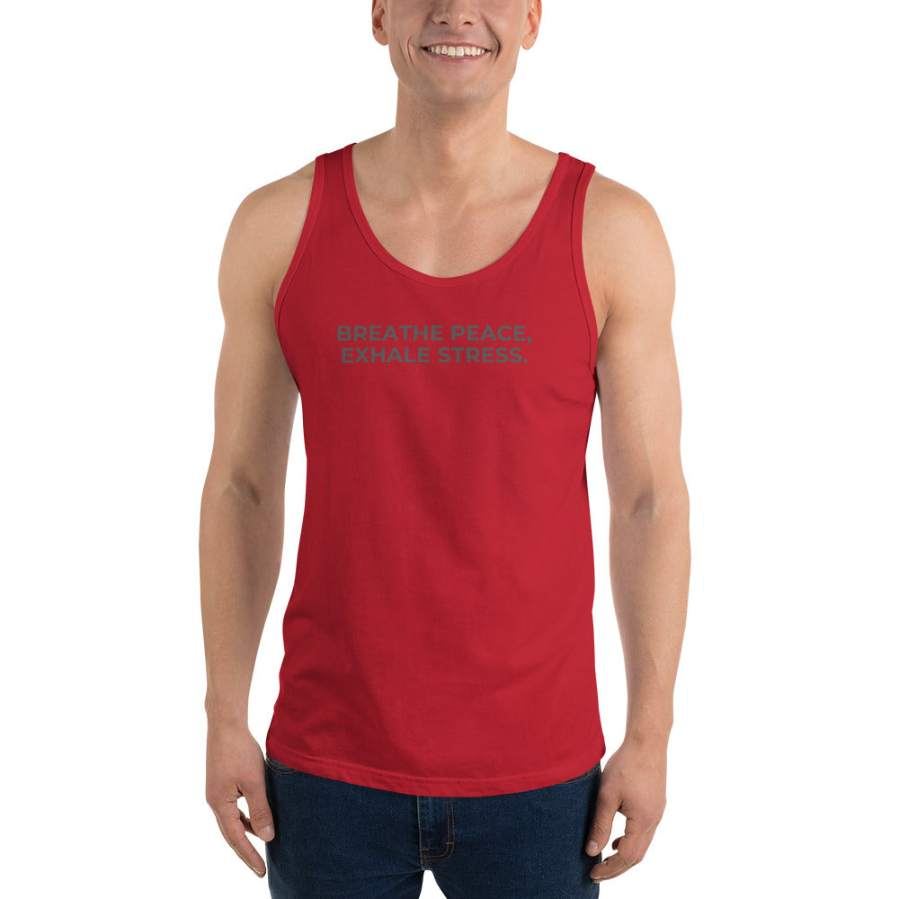 Man wearing a red sleeveless tank with "Breathe Peace, Exhale Stress" text.