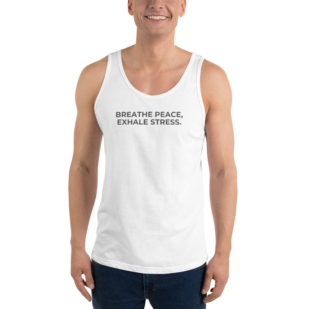 Man wearing a white sleeveless tank with "Breathe Peace, Exhale Stress" text.