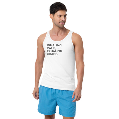 Man wearing an white sleeveless tank with "Inhaling Calm, Exhaling Chaos" text. 