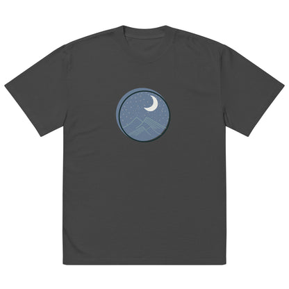 Men’s oversized black faded tee with a moon and mountains design.