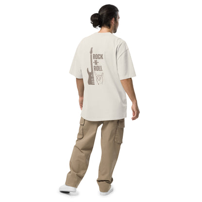 Man viewed from behind wearing Iconic Rock-N-Roll faded bone Oversized Tee, capturing the essence of rock music in fashion.