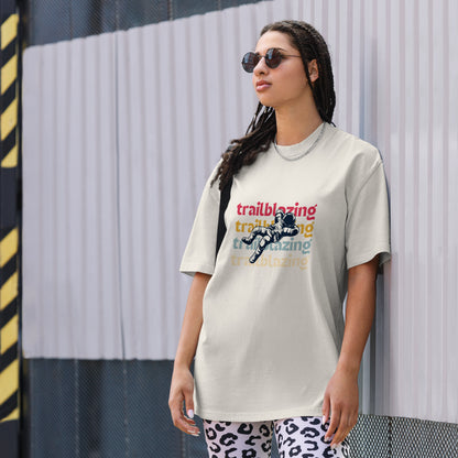 Woman exuding confidence in a Women's Trailblazing Statement faded bone Oversized Tee, highlighting a bold and fearless fashion choice.