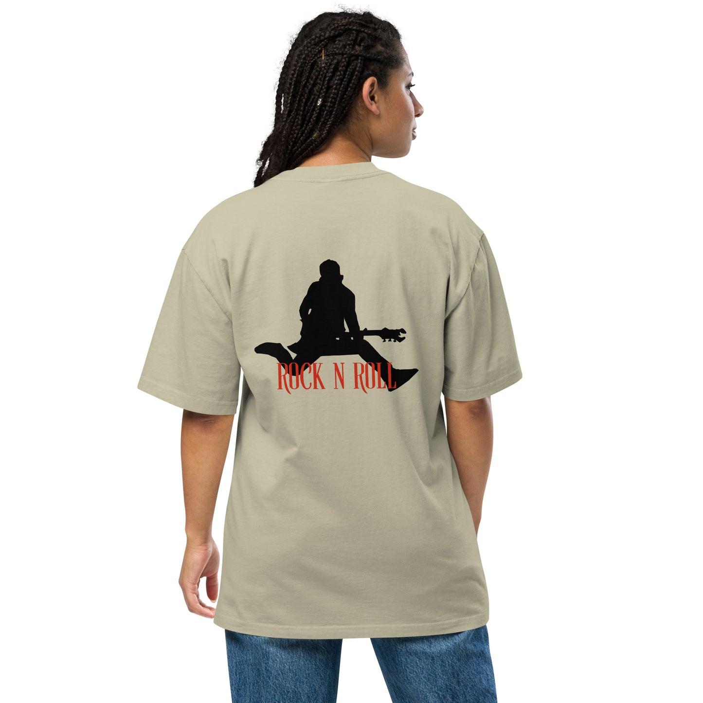 Woman facing away, wearing a Be You Out Loud faded eucalyptus oversized tee with a "Rock N Roll" silhouette design, exuding a vintage yet edgy style