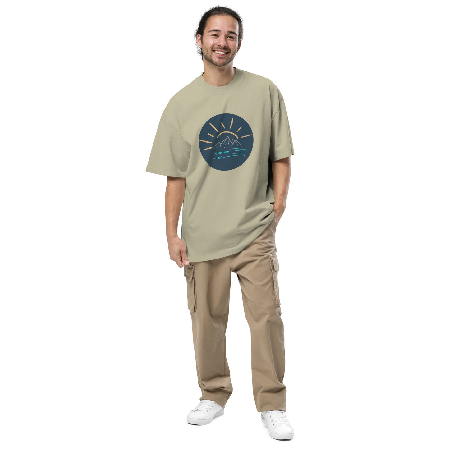 Men’s oversized faded eucalyptus tee with a mountain sunrise design.