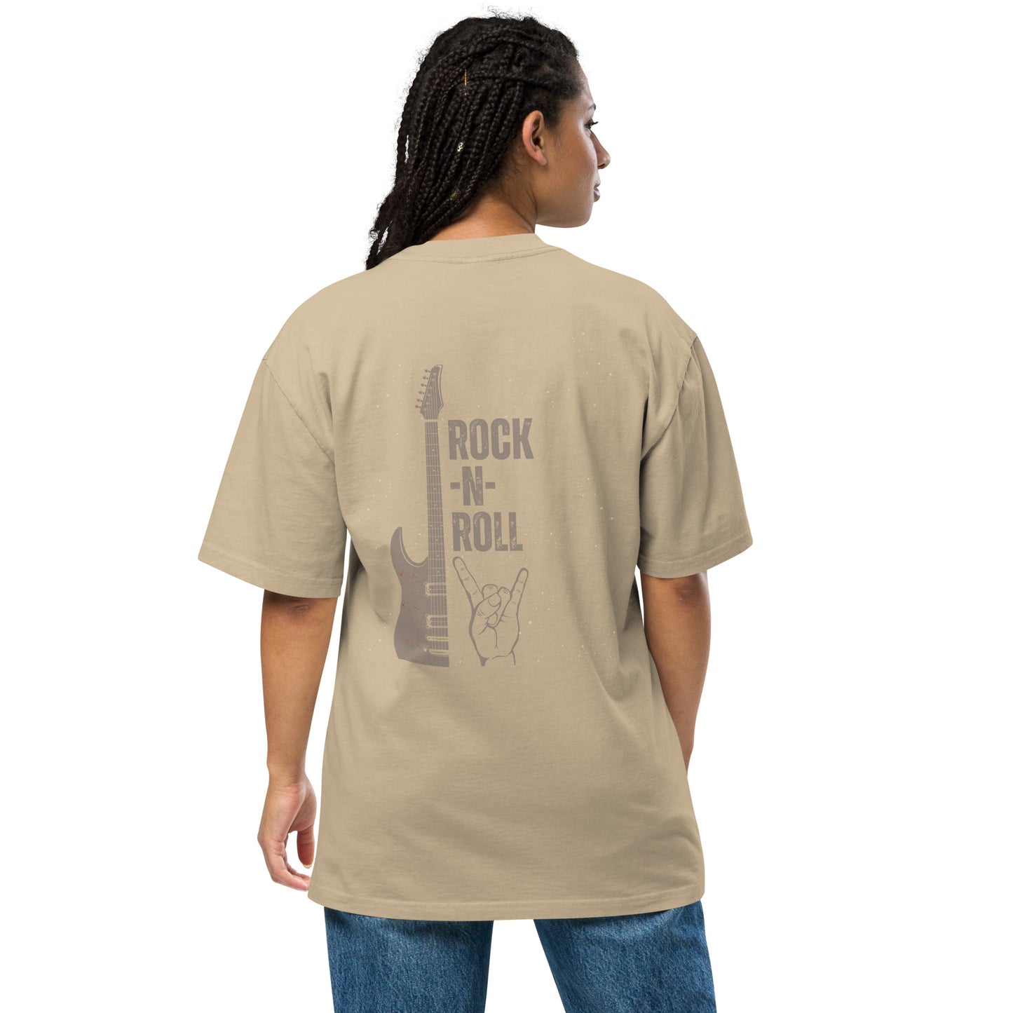 Woman turns heads in a Women's Rockin’ Retro faded khaki  Oversized Graphic Tee featuring a vintage guitar and rock hand gesture, embodying the timeless spirit of rock n' roll.