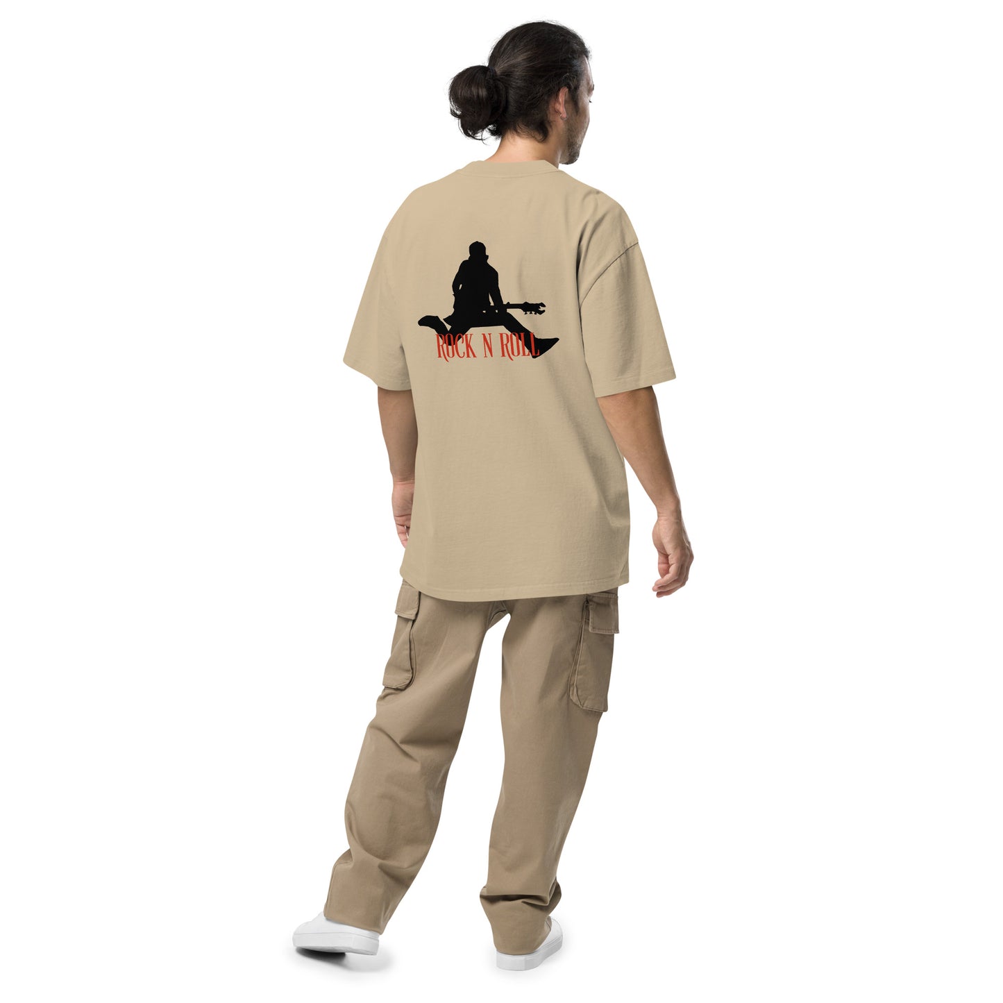 Rear view of a man wearing  Men’s Iconic Rock n’ Roll faded khaki Oversized Tee, exuding a timeless, rebellious spirit.