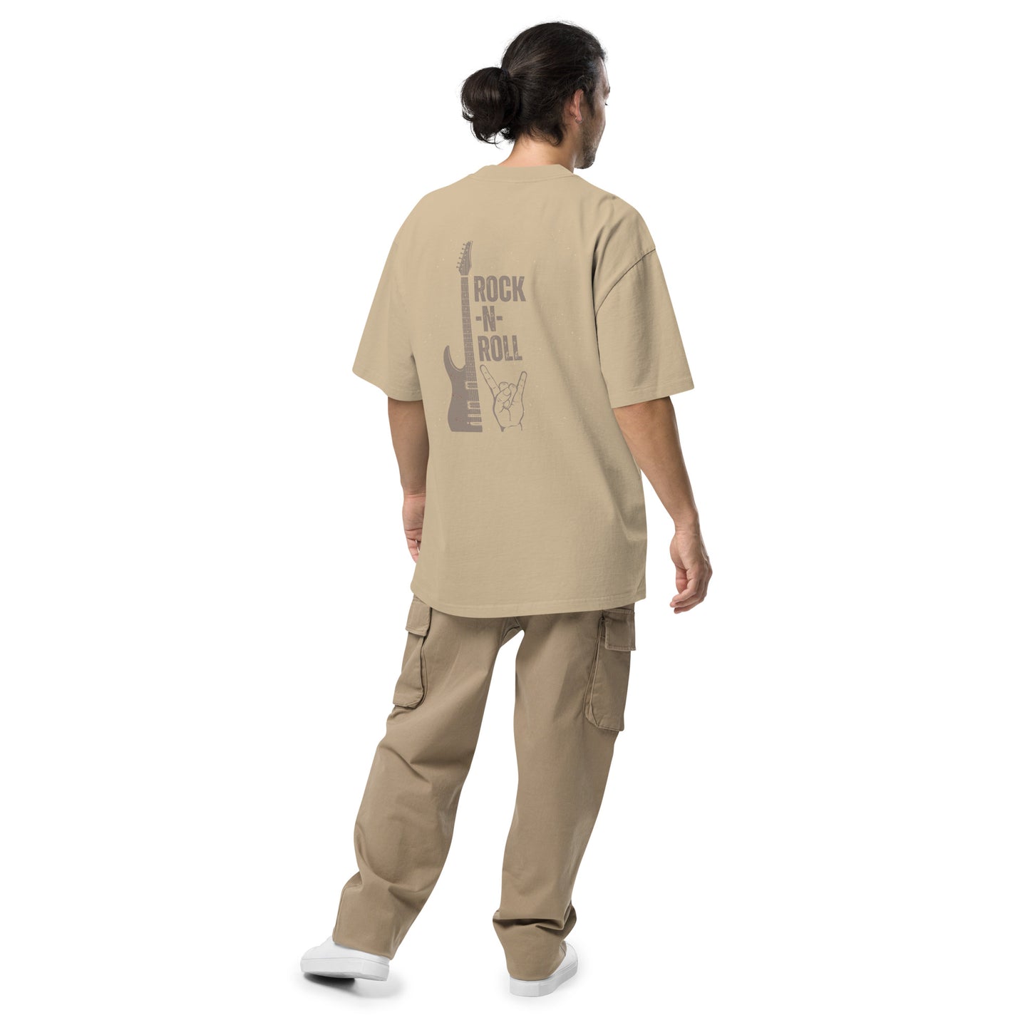 Man viewed from behind wearing Iconic Rock-N-Roll faded khaki Oversized Tee, capturing the essence of rock music in fashion.