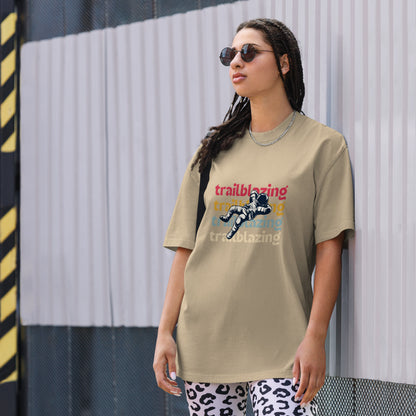 Woman exuding confidence in a Women's Trailblazing Statement faded khaki Oversized Tee, highlighting a bold and fearless fashion choice.