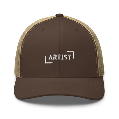 Dark brown and Khaki trucker cap with white "ARTIST" embroidery on the front, featuring a mesh back and an adjustable strap for a personalized fit.