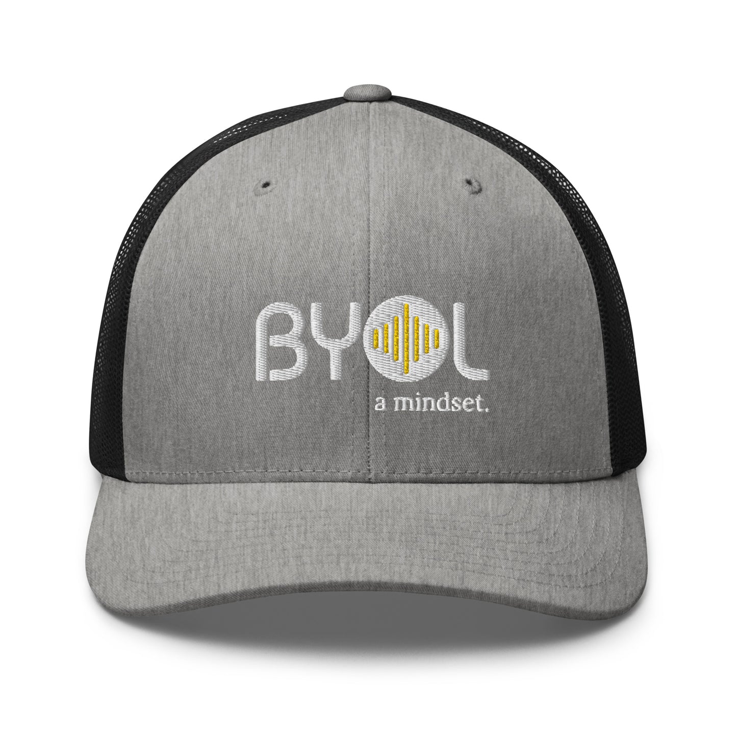 Grey and black retro trucker hat with "BYOL a mindset" embroidered on the front in gray and yellow, displayed against a clean background. Available in various colors: black, white, brown, green, and beige.