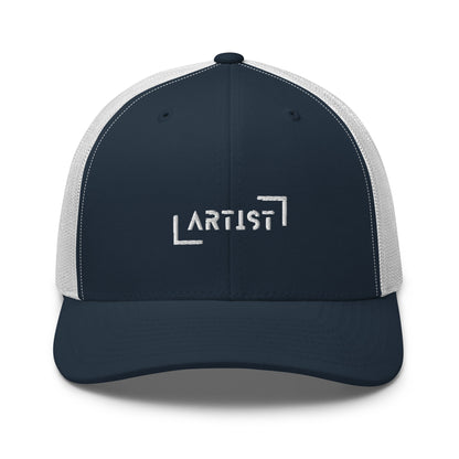 Blue and White trucker cap with white "ARTIST" embroidery on the front, featuring a mesh back and an adjustable strap for a personalized fit.