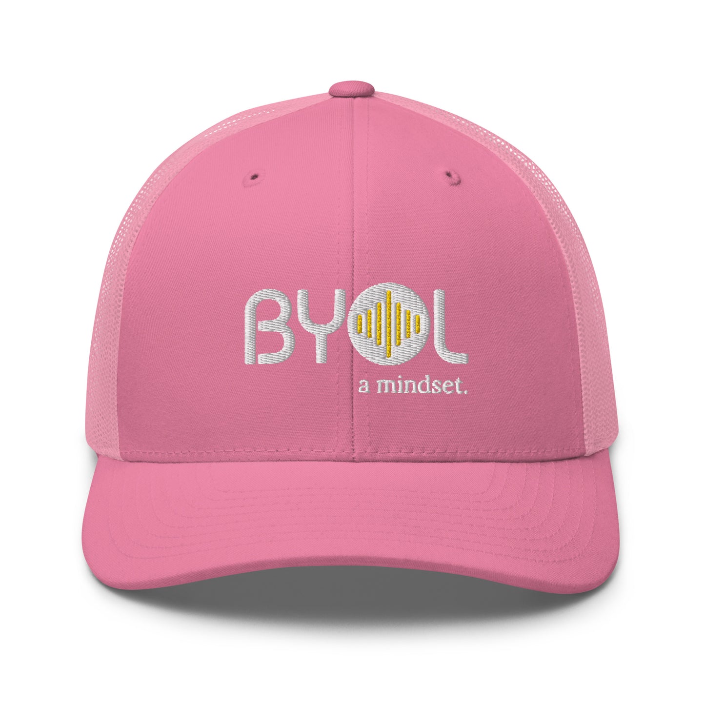 Pink retro trucker hat with "BYOL a mindset" embroidered on the front in gray and yellow, displayed against a clean background. Available in various colors: black, white, brown, green, and beige.