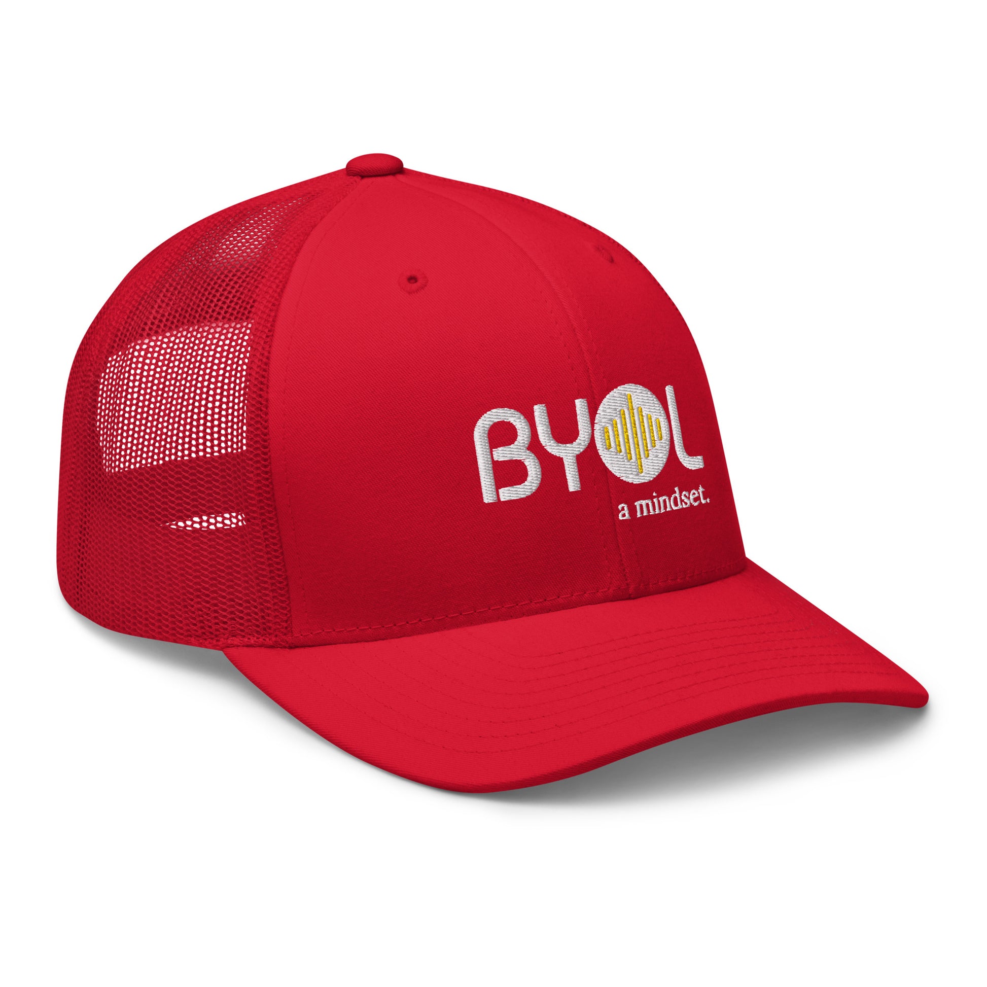 Red retro trucker hat with "BYOL a mindset" embroidered on the front in white and yellow, displayed against a clean background. Available in various colors: black, white, brown, green, and beige.