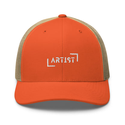 Orange and khaki trucker cap with white "ARTIST" embroidery on the front, featuring a mesh back and an adjustable strap for a personalized fit.