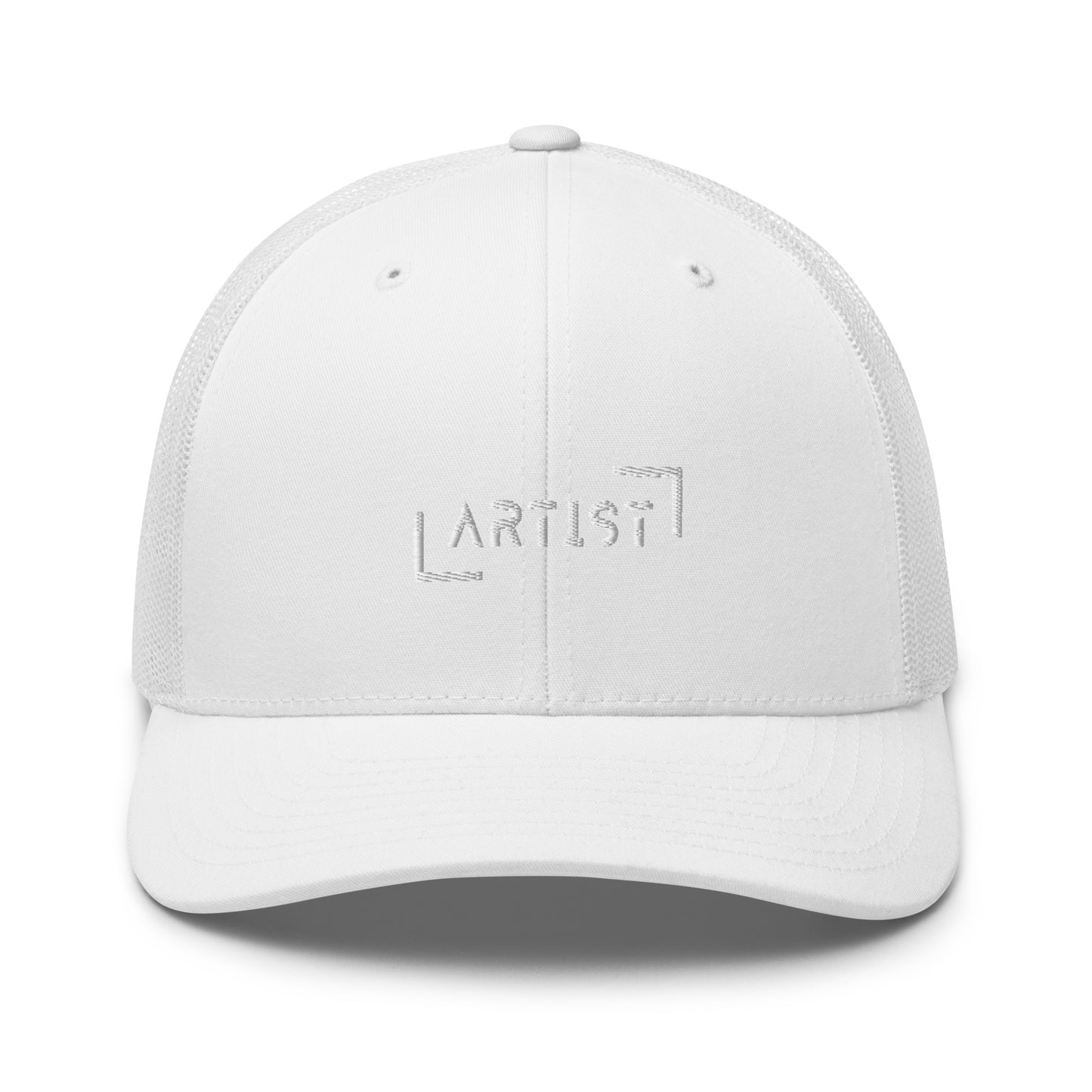 White trucker cap with white "ARTIST" embroidery on the front, featuring a mesh back and an adjustable strap for a personalized fit.