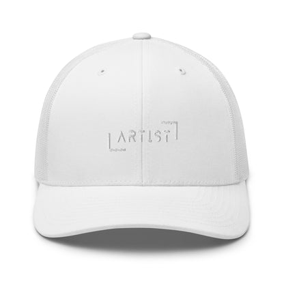 White trucker cap with white "ARTIST" embroidery on the front, featuring a mesh back and an adjustable strap for a personalized fit.