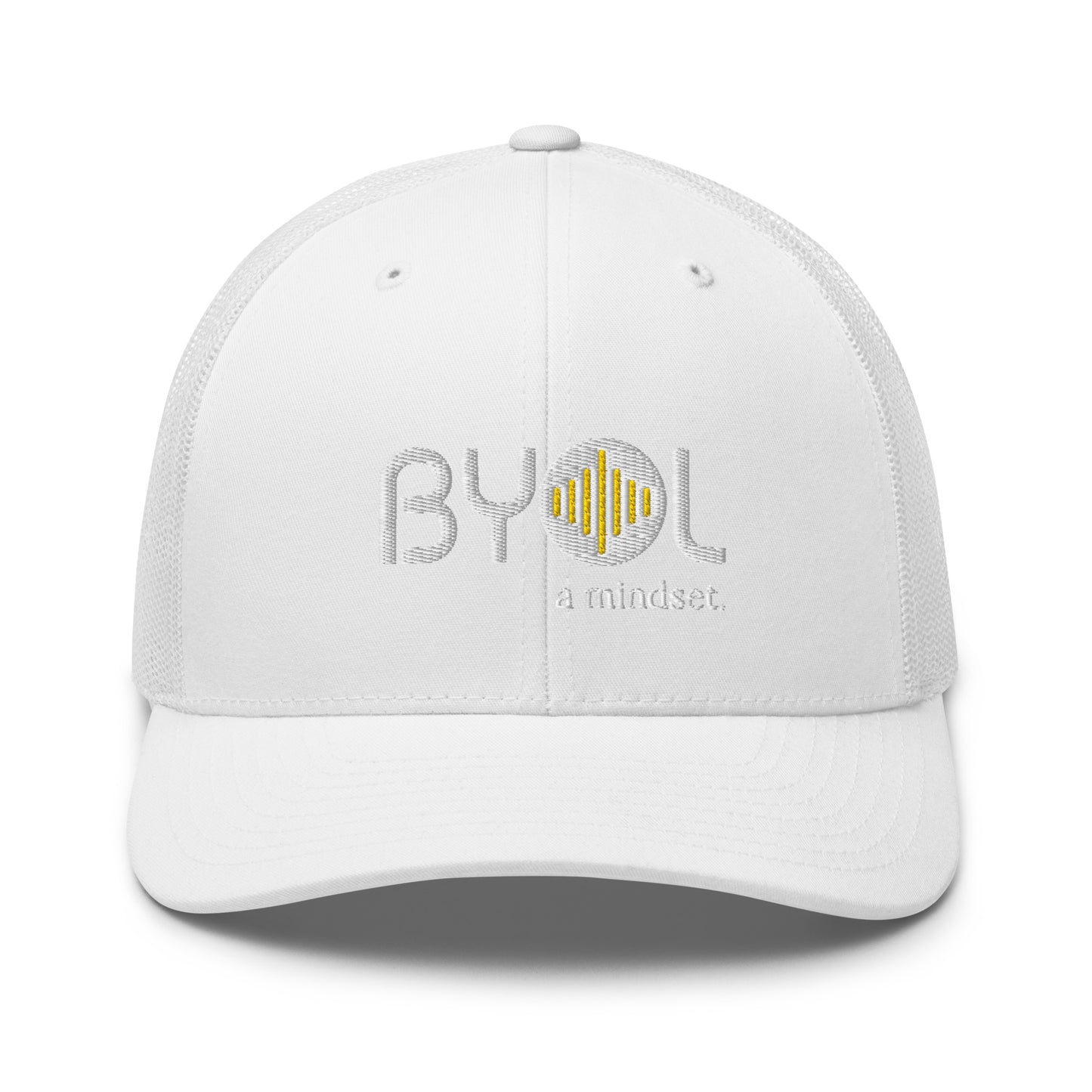 White retro trucker hat with "BYOL a mindset" embroidered on the front in gray and yellow, displayed against a clean background. Available in various colors: black, white, brown, green, and beige.