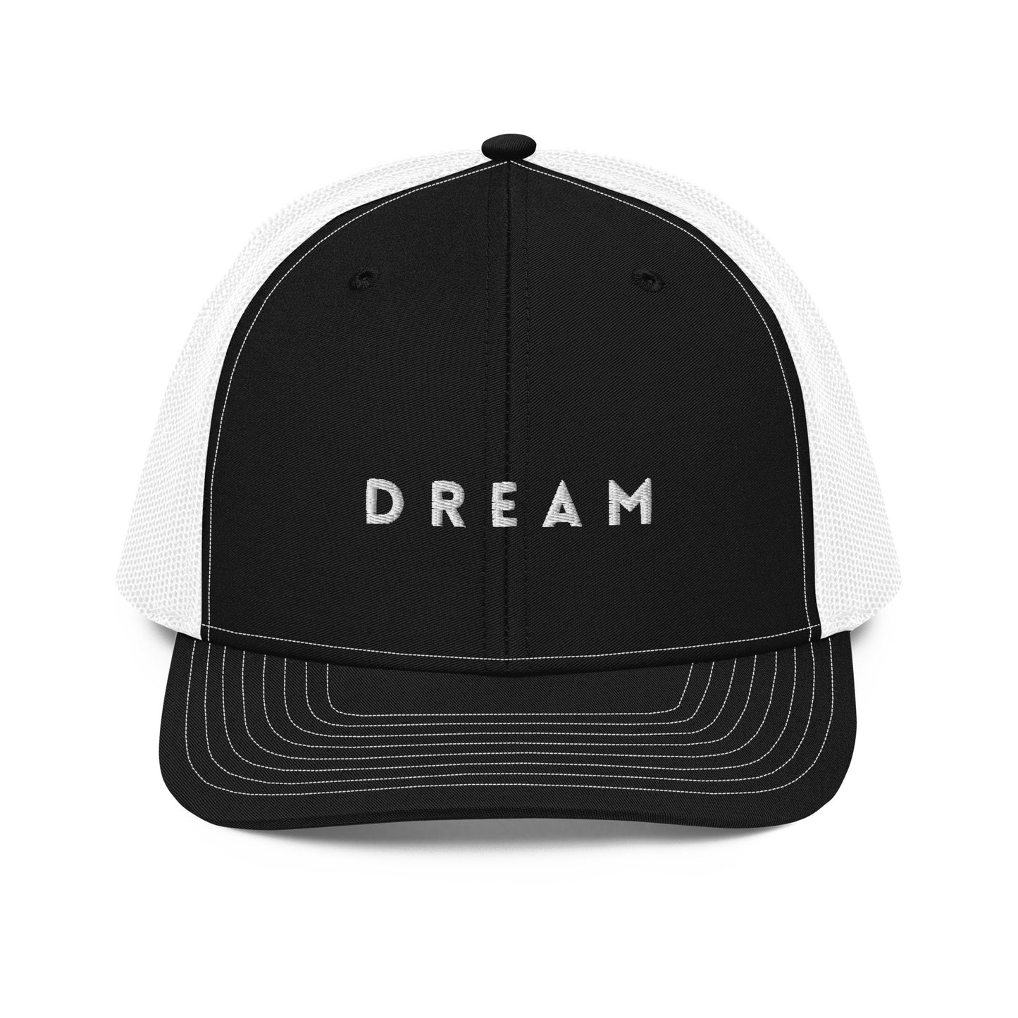 An black and white snapback trucker cap featuring the word "DREAM" in bold white letters embroidered across the front panel. This cap is designed with a curved visor, structured front crown, and breathable mesh panels on the sides and back, complete with an adjustable snap closure for a personalized fit.