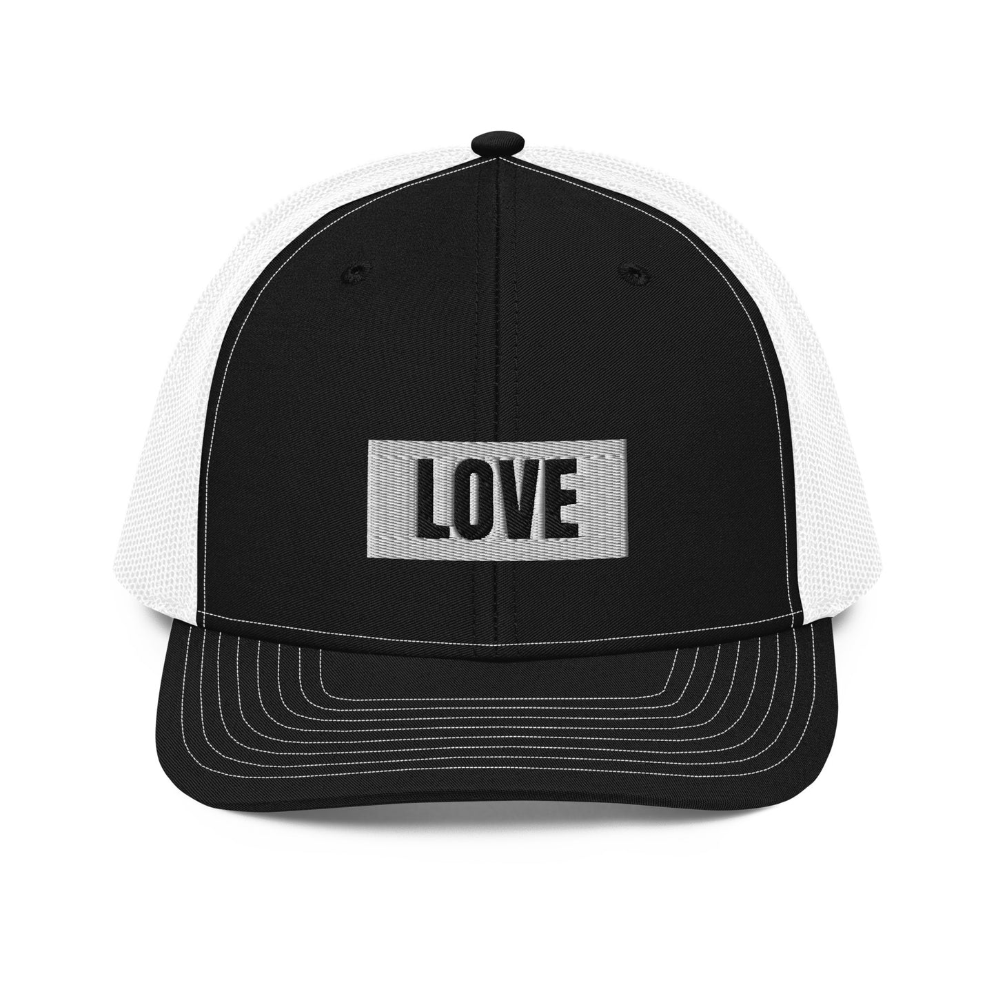 A black snapback trucker cap with the word "LOVE" in white block letters inside a white rectangle, embroidered on the front panel. The hat features a curved brim, white mesh back panels for ventilation, and an adjustable snap closure for a comfortable, custom fit.