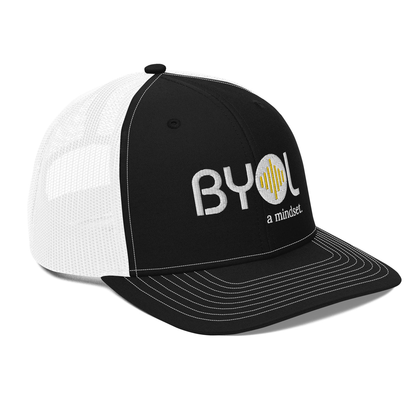 Black and white pre-curved contrast stitched trucker hat with "BYOL a mindset" embroidered on the front in white and yellow displayed against a clean background. Available in various colors: maroon, black, green, and gray.