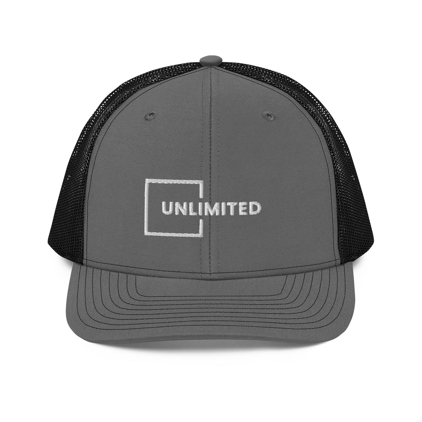 A grey and black snapback trucker cap featuring the word "UNLIMITED" in white block letters enclosed within a white line square, embroidered on the front panel. The cap has a pre-curved visor, structured crown, breathable mesh panels on the sides and back, and an adjustable snap closure for a comfortable fit.