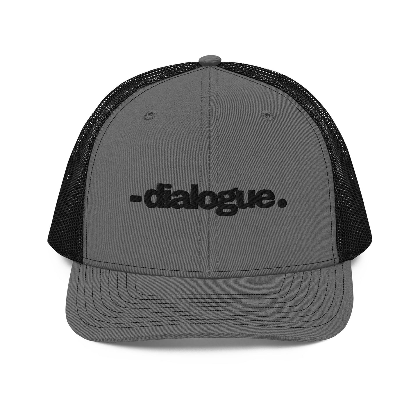 A grey and black snapback trucker cap with the word "-dialogue." in black, modern font, centered on the front panel. The cap is designed with a curved brim, white mesh back panels for breathability, and an adjustable snap closure for a customizable fit.