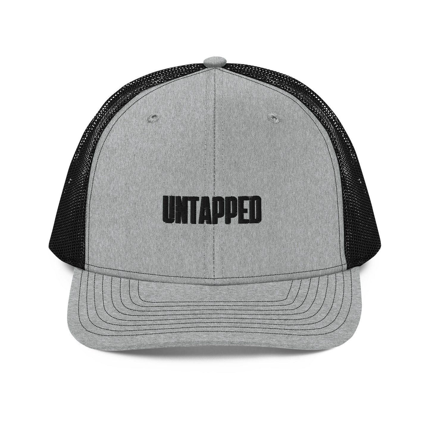 A grey and black snapback trucker cap with the word "UNTAPPED" embroidered in bold black letters on the front panel. The cap includes a curved brim, ventilated mesh panels on the sides and back for breathability, and an adjustable snap at the back for a customizable fit.