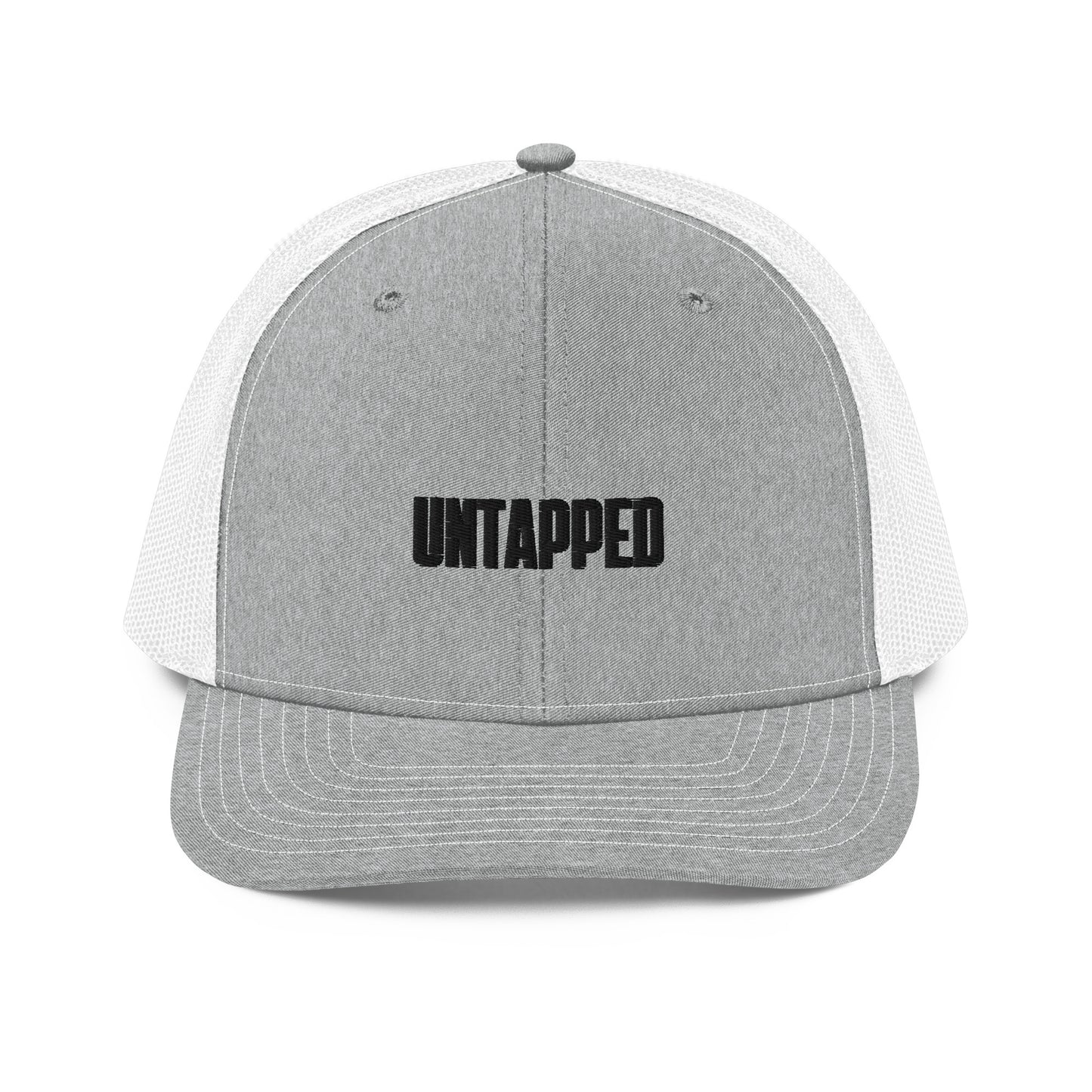 A grey and white snapback trucker cap with the word "UNTAPPED" embroidered in bold black letters on the front panel. The cap includes a curved brim, ventilated mesh panels on the sides and back for breathability, and an adjustable snap at the back for a customizable fit.