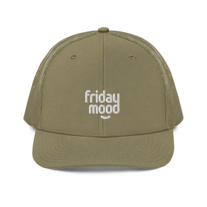 A front view of a military green snapback trucker cap with the phrase "friday mood" embroidered in white lowercase letters on the front panel. The cap features a pre-curved visor, a top button, and white breathable mesh back panels, designed for a casual and comfortable fit.