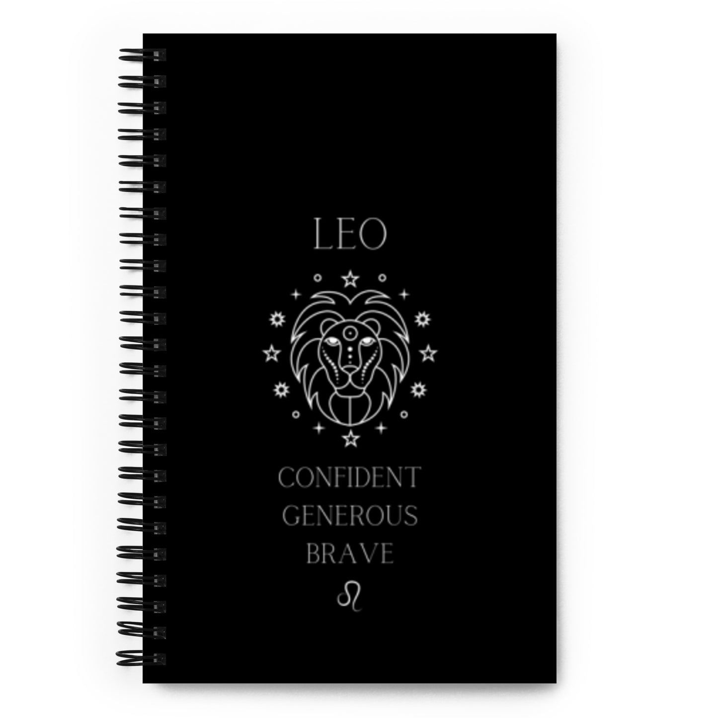 A black spiral-bound notebook with a stylized lion emblem representing the Leo zodiac sign. Below the lion are the words "CONFIDENT GENEROUS BRAVE" in white, capturing the essence of Leo's spirited attributes. Stars and astrological symbols frame the lion, adding a cosmic elegance to the design. This notebook is an ideal choice for the bold and creative Leo to pen their thoughts, ambitions, and plans.