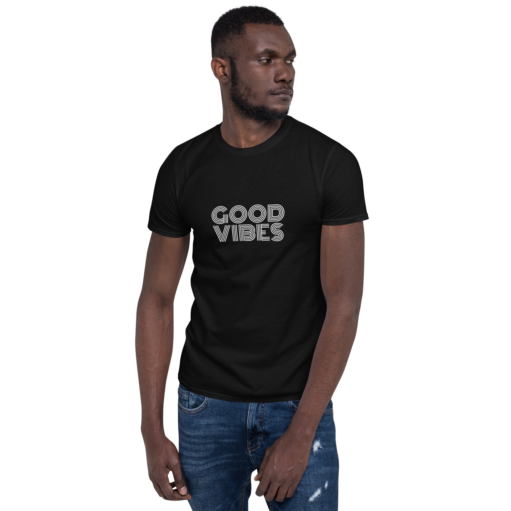 Man wearing a black soft cotton t-shirt with 'Good Vibes' printed in white