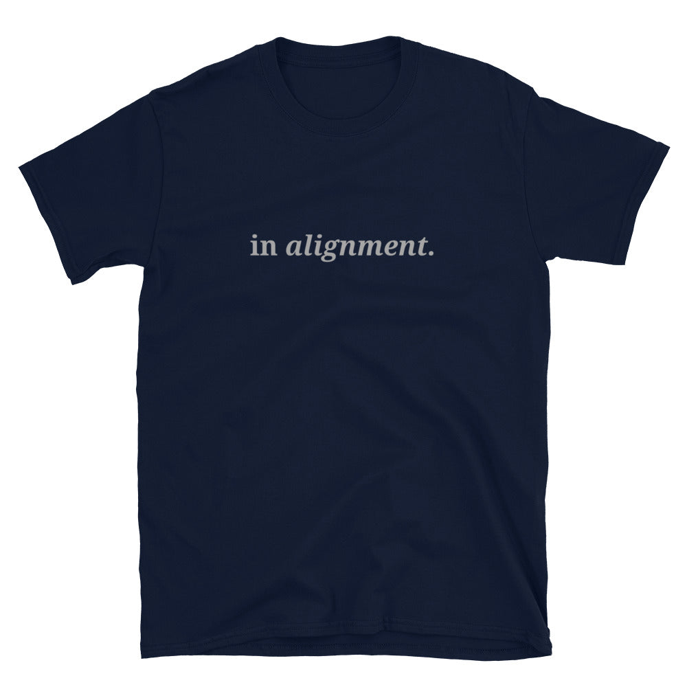 Navy blue t-shirt with the phrase "in alignment." printed on the front, available in color options black, navy blue, gray, and white, available in sizes S to 3XL.