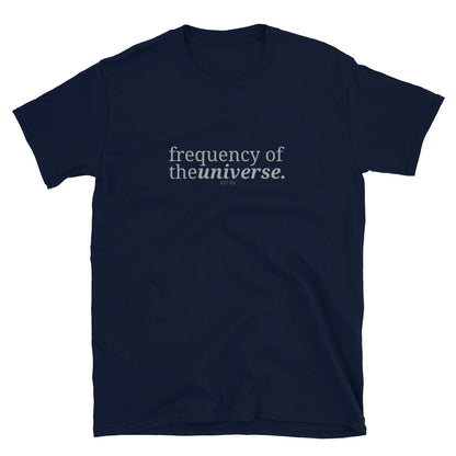 Navy blue t-shirt with the phrase "frequency of the universe." printed on the front, available in color options black, navy blue, gray, white, and light blue, in sizes S to 3XL.