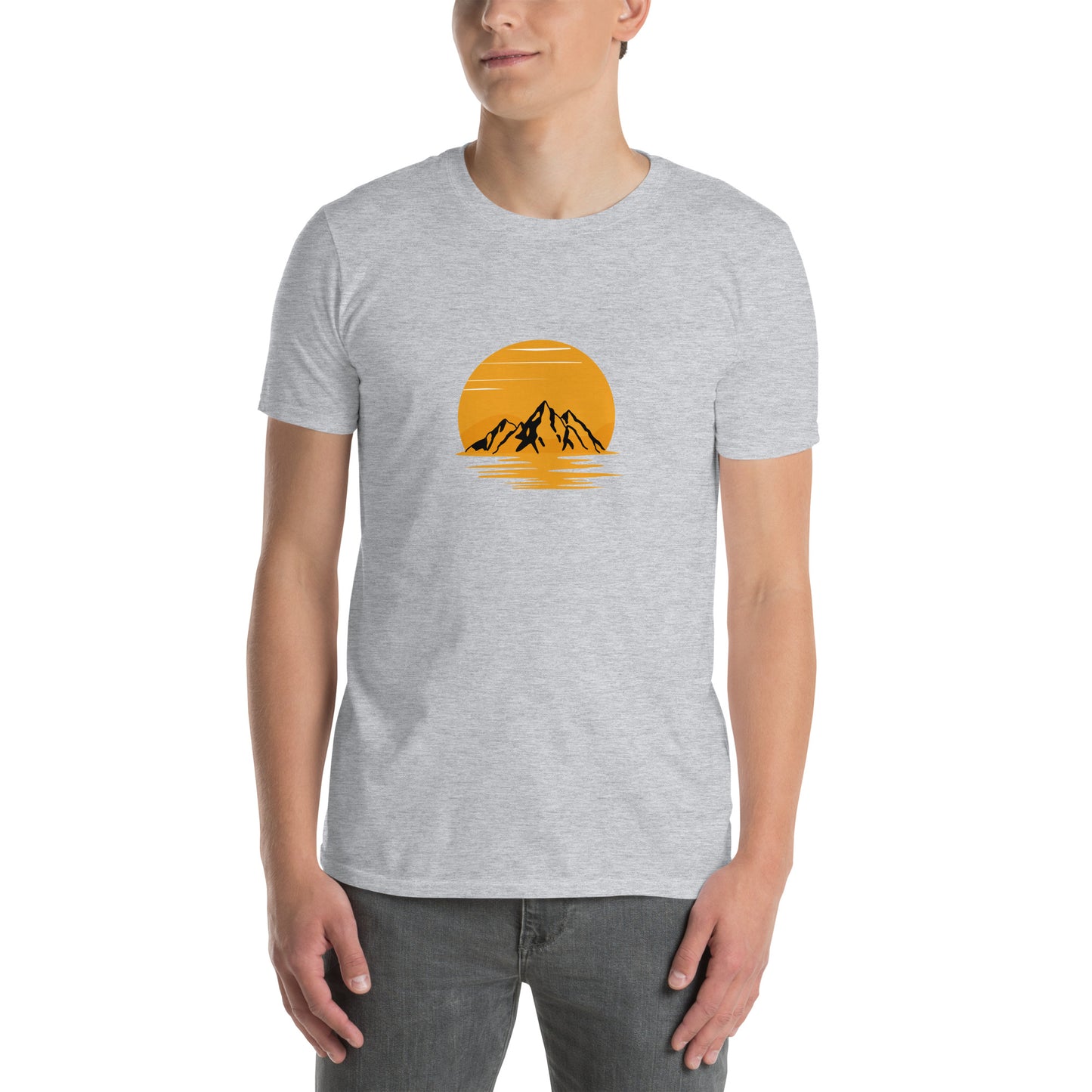 Man wearing a athletic grey soft cotton t-shirt with a mountain sunset design, perfect for inspiring bold self-expression