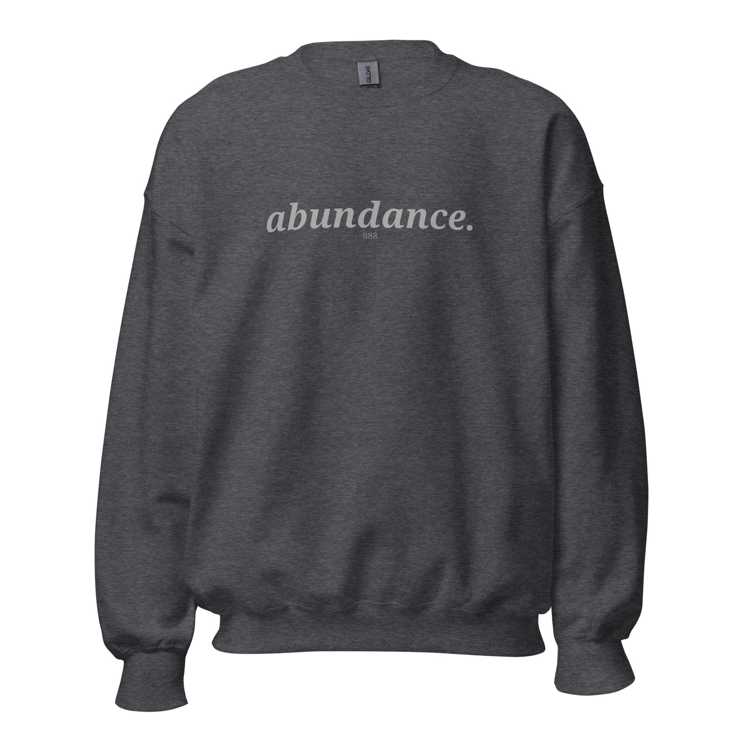 Dark heather sweatshirt with the phrase "abundance." printed on the front, available in color options navy blue, green, maroon, gray, and pink, available in sizes S to 3XL.